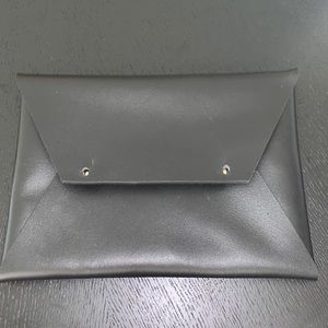 Tribe Alive black clutch - never used